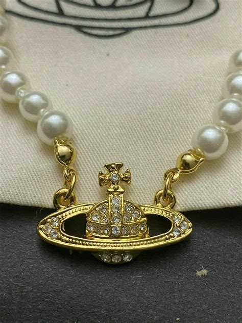 necklace with pearls and saturn|saturn pearl necklace vivienne westwood.